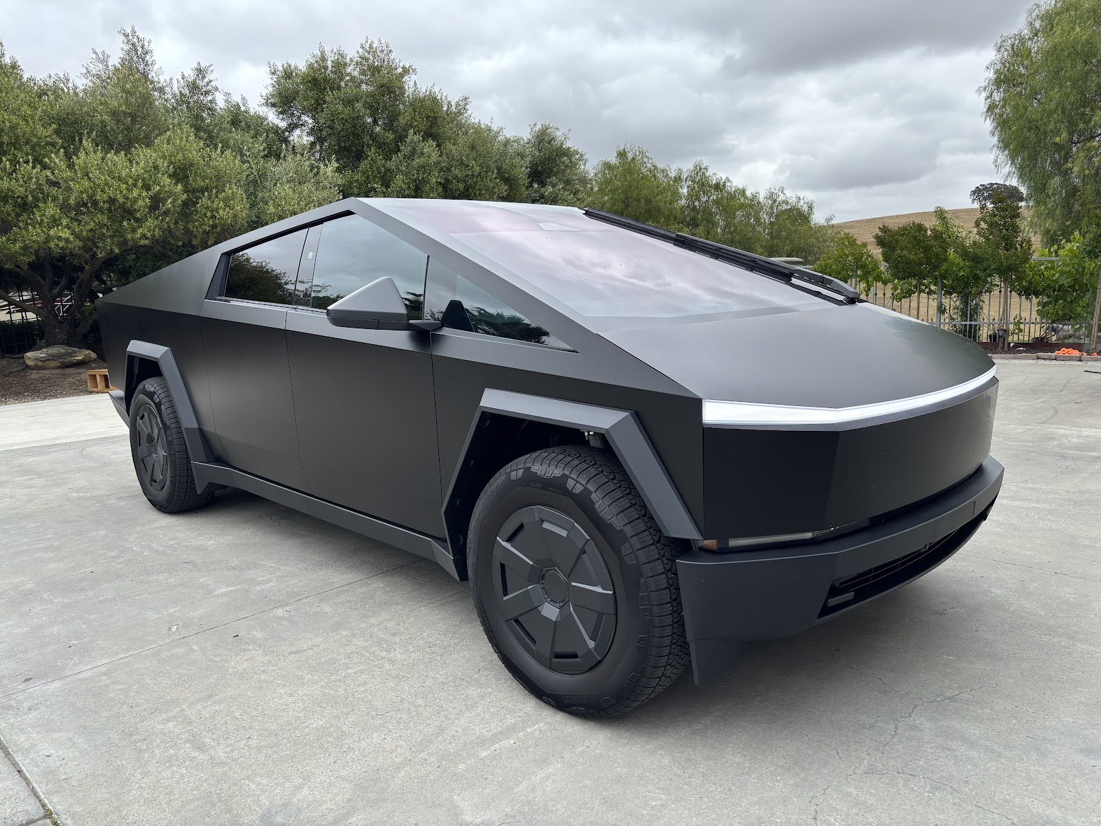 Matte black Tesla Cybertruck with window tint by Roman's