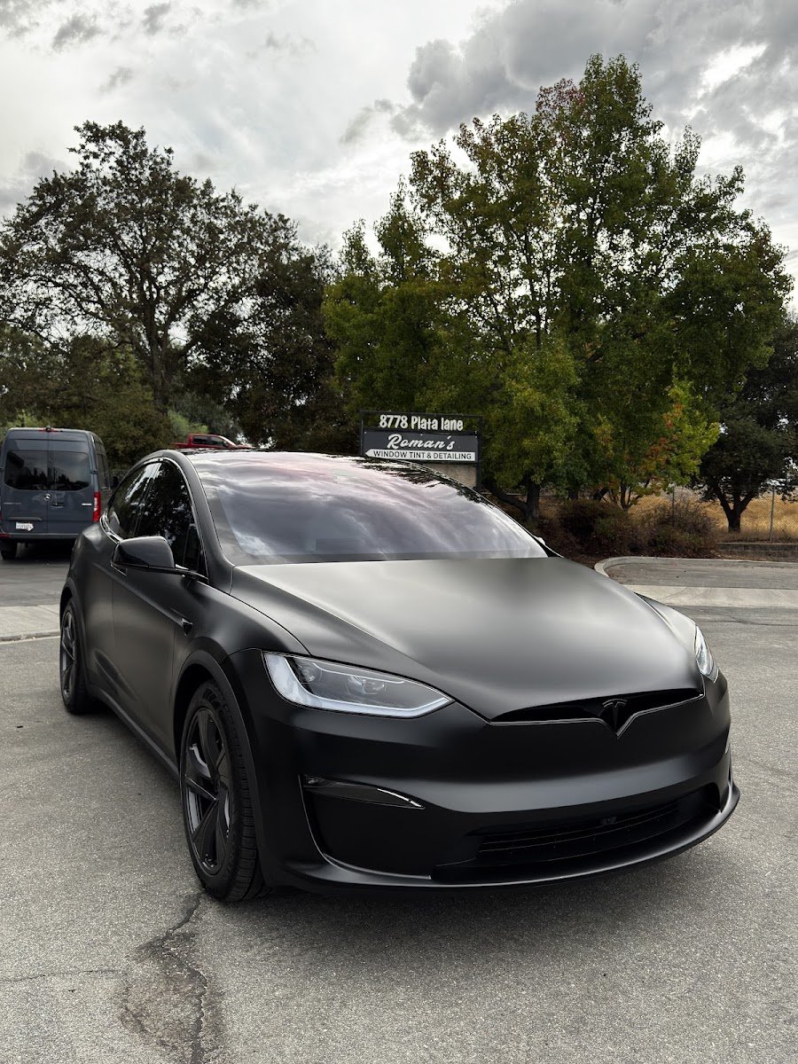 Matte black Tesla Model X with window tint by Roman's