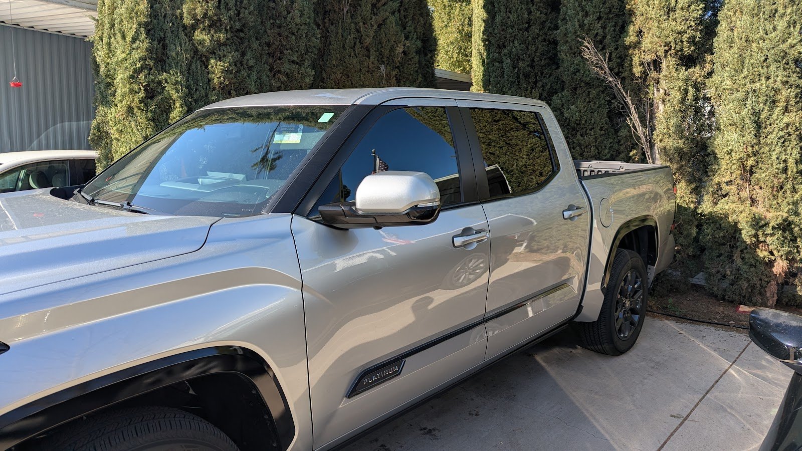 Silver Toyota Tundra with window tint by Roman's